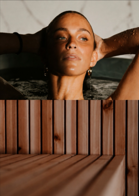 Member cooling off in the plunge pool beside the cedar sauna benches